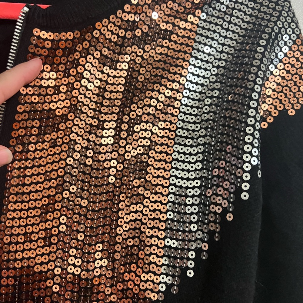 Cute black cardigan with sparkle detail!  Perfect for holiday parties!